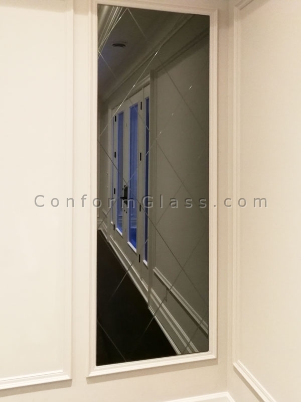 Custom mirror with V-groove decorative pattern