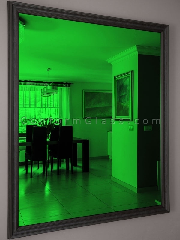 Dark green mirror in dining room