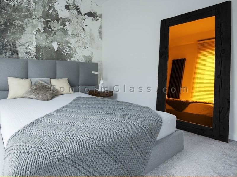 Framed Gold Mirror in the bedroom