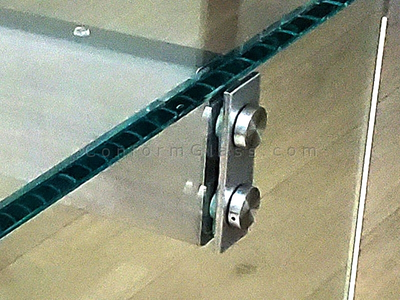 Custom glass desk metal details