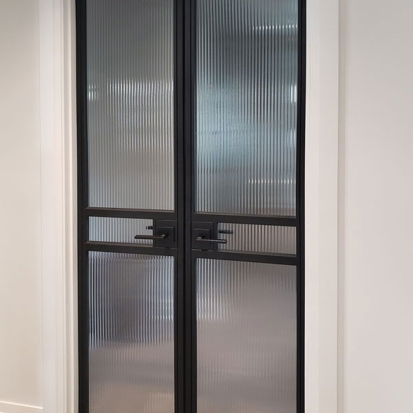 Interior French Door with Welded Metal Frame and Reeded Glass